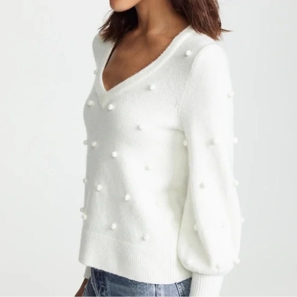 Elegant White Sweater with Pom-Pom Details